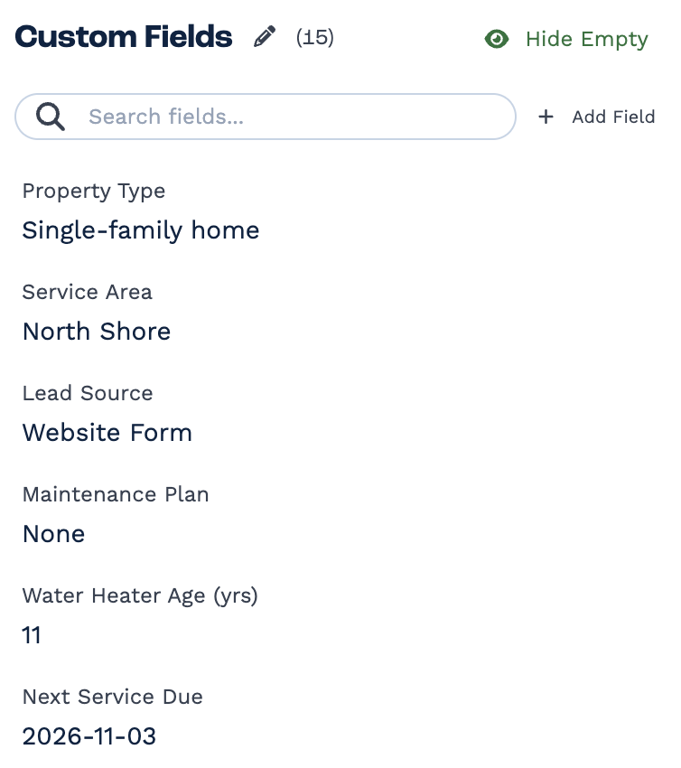 The Custom Fields section of a client panel, with a count of 15, the pencil, Hide Empty, a search box and Add Field. The first fields are Property Type: Single-family home, Service Area: North Shore, Lead Source: Website Form, Maintenance Plan: None, Water Heater Age (yrs): 11 and Next Service Due: 2026-11-03