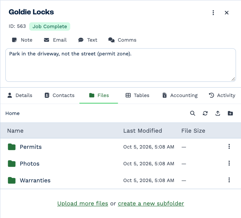 The Files tab on Goldie Locks: the breadcrumb Home, buttons to search, refresh, upload and add a folder, and the folders Permits, Photos and Warranties with when each was last changed